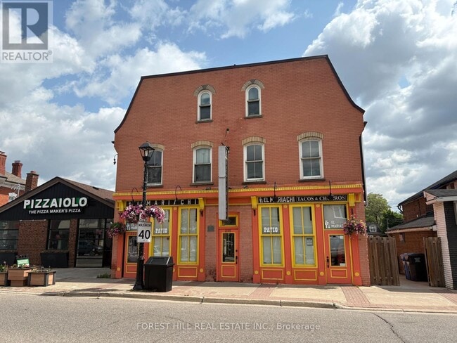 property at 235-235 Queen St S