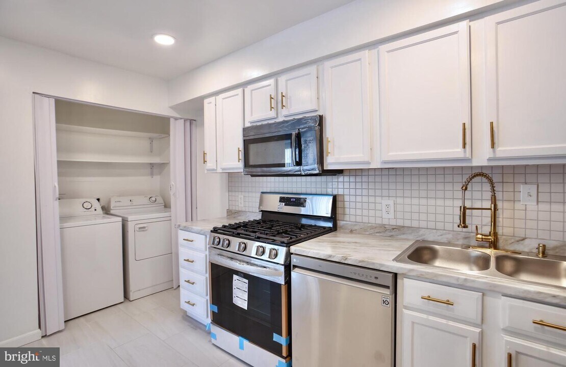 2303 Olson St-Unit -103 in Hillcrest Heights, MD - Building Photo