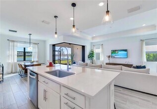 20419 Pebble Gln Dr, Unit 201-1207 in Estero, FL - Building Photo - Building Photo