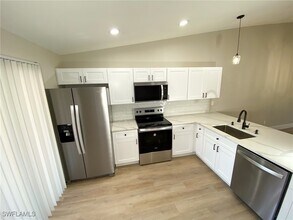 4180 Looking Glass Ln in Naples, FL - Building Photo - Building Photo