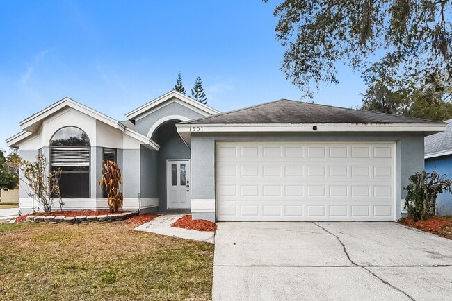 property at 1501 Woodfield Oaks Dr