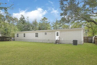 18565 Huckleberry Ln in Porter, TX - Foto de edificio - Building Photo