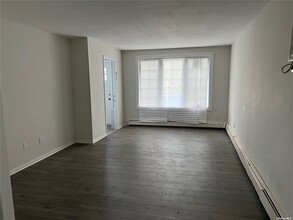 296 Doherty Ave-Unit -1 in Elmont, NY - Building Photo - Building Photo
