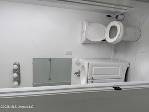 212 E 2nd St in Pass Christian, MS - Foto de edificio - Building Photo