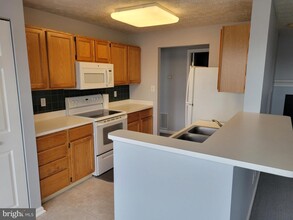 2454 Apple Blossom Ln-Unit -203 in Odenton, MD - Building Photo - Building Photo