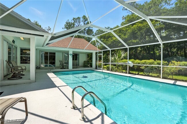 5891 Golden Oaks Ln in Naples, FL - Building Photo - Building Photo