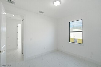 2404-2406 Mae Ave S in Lehigh Acres, FL - Building Photo - Building Photo