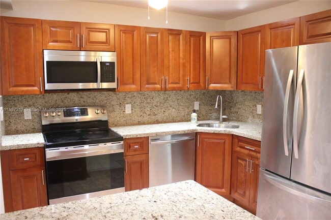 property at 8958 Collins Ave