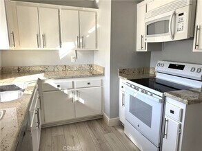 7735 Moordale Cir, Unit 246 in Stanton, CA - Building Photo - Building Photo