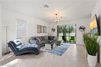 14121 Pine Lodge Ln in Miromar Lakes, FL - Building Photo - Building Photo