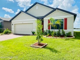 2164 Farmhouse Rd SE in Palm Bay, FL - Building Photo