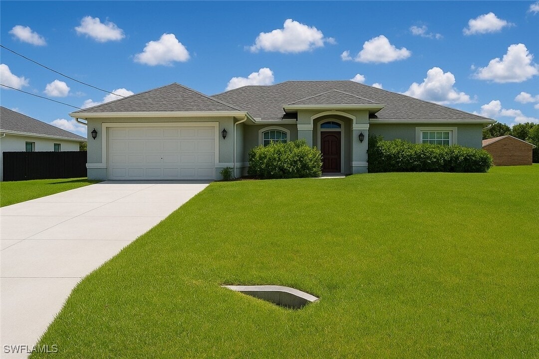 1909 Richland Ave in Lehigh Acres, FL - Building Photo