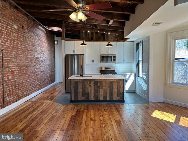 property at 115 W 13th St