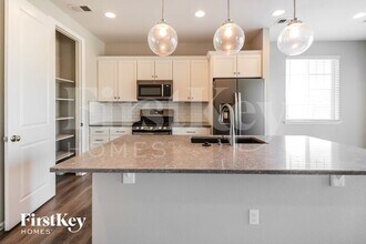 21033 E Tufts Ave in Aurora, CO - Building Photo - Building Photo