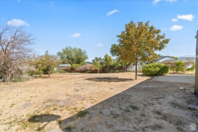7390 W Candis Pl in Magna, UT - Building Photo - Building Photo