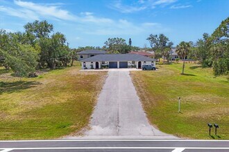 255 Rotonda Blvd W in Rotonda West, FL - Foto de edificio - Building Photo