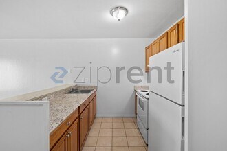 100 Village Dr in Brentwood, CA - Building Photo - Building Photo