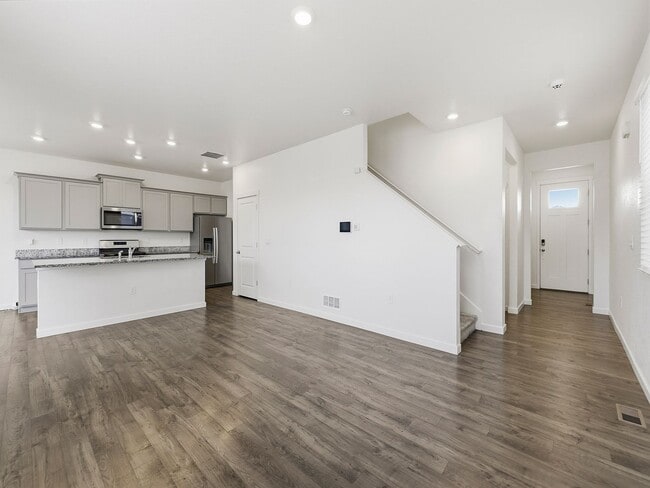 Beautiful Home in Severance with 3-Car Garage, Fenced Yard, and Central A/C! in Severance, CO - Building Photo - Building Photo