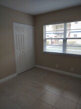 1524 SE Royal Green Cir, Unit Q102 in Port St. Lucie, FL - Foto de edificio - Building Photo