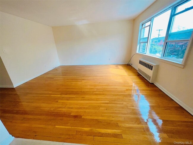 property at 61-50 219th St