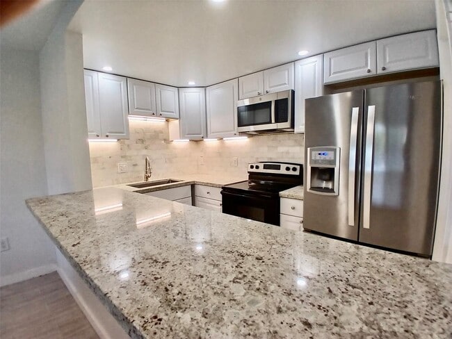 property at 4164 Inverrary Dr