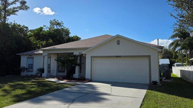 2466 SW Mercer St in Port St. Lucie, FL - Building Photo - Building Photo