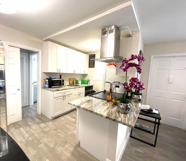 property at 115 SW 1st Ave
