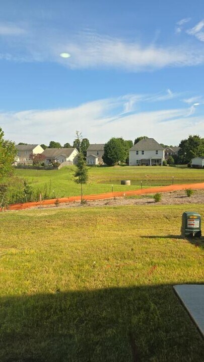 7055 Eclipse Trl in Whitsett, NC - Building Photo