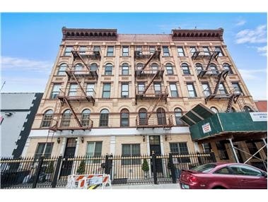 239-245 E 120th St in New York, NY - Building Photo