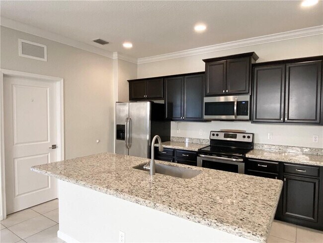 4028 Tomoka Dr in Atlantis, FL - Building Photo - Building Photo
