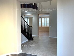 9203 Bronze River Ave in Las Vegas, NV - Building Photo - Building Photo