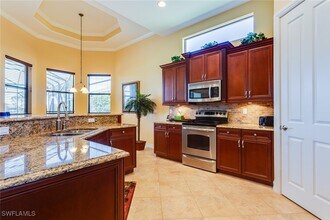 7747 Cottesmore Dr in Naples, FL - Building Photo - Building Photo