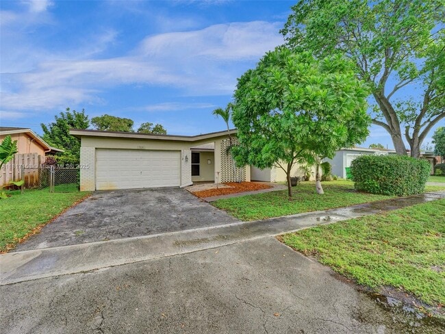 property at 7231 NW 20th St