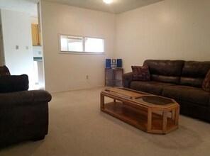 68 12th St, Unit 4 in Wheatland, WY - Building Photo - Building Photo