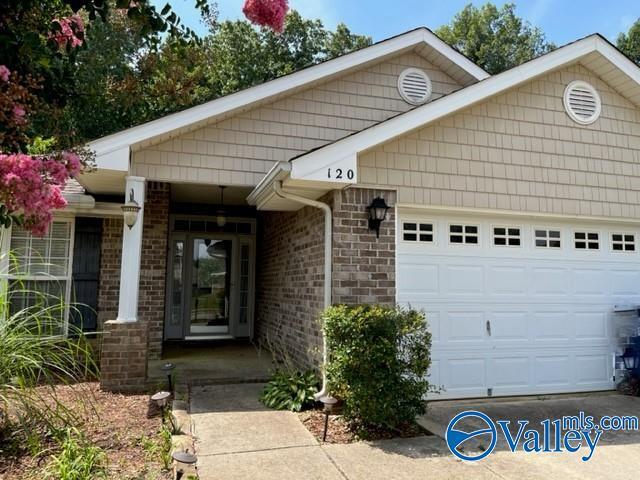 property at 120 NW Wittington Ln
