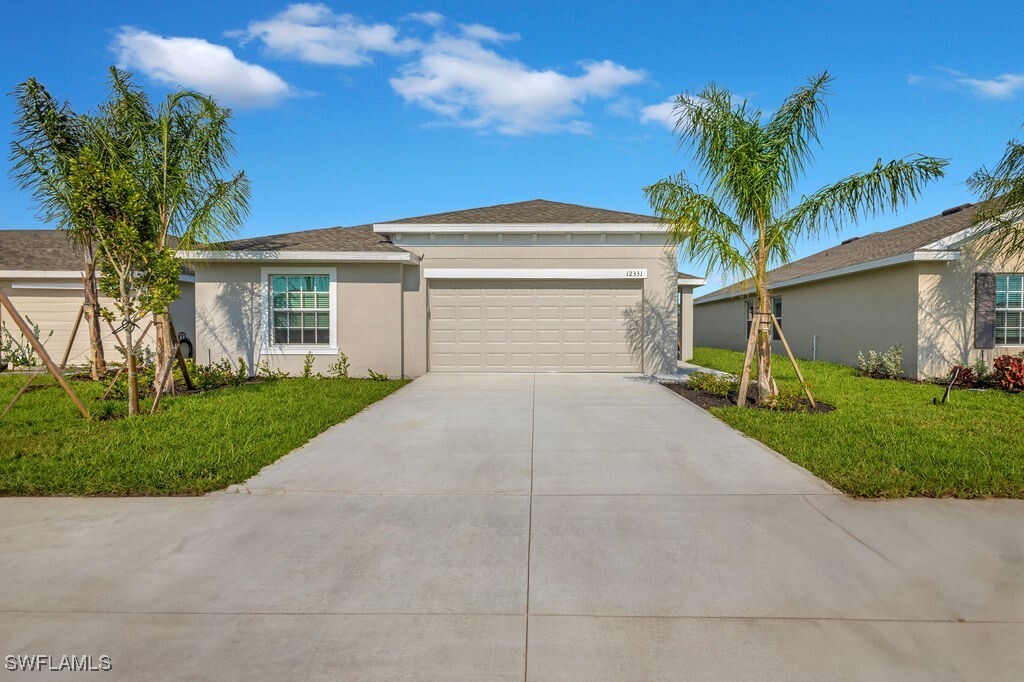 12331 Amber Waves Rd in Lehigh Acres, FL - Building Photo