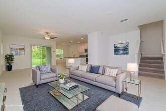 7310 Spring Snowflake Ave in Palm River-Clair Mel, FL - Building Photo - Building Photo