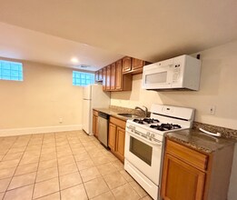 1568 Tremont St, Unit 1 in Boston, MA - Foto de edificio - Building Photo