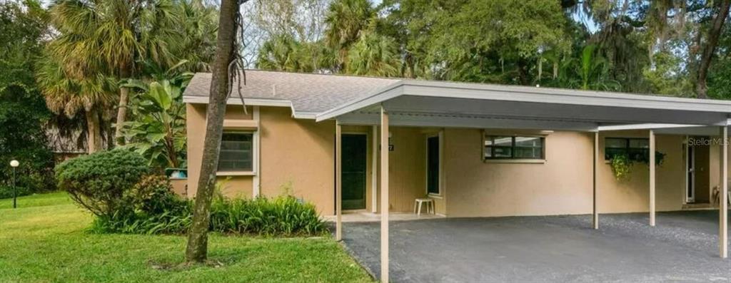 4977 Village Garden Dr in Sarasota, FL - Building Photo