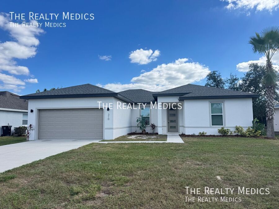 310 Drum Ct in Poinciana, FL - Building Photo