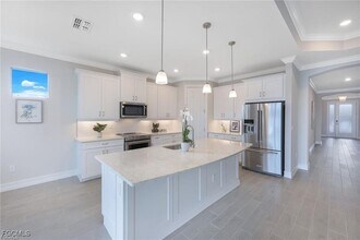 514 Kamari Cv in Naples, FL - Building Photo - Building Photo