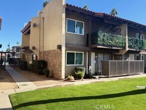 51080 Eisenhower Dr, Unit 409 in La Quinta, CA - Building Photo - Building Photo