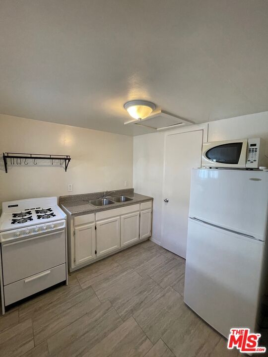 3423-3425 Walton Ave in Los Angeles, CA - Building Photo - Building Photo