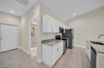 2118 Zaharihas Dr in Lehigh Acres, FL - Building Photo - Building Photo