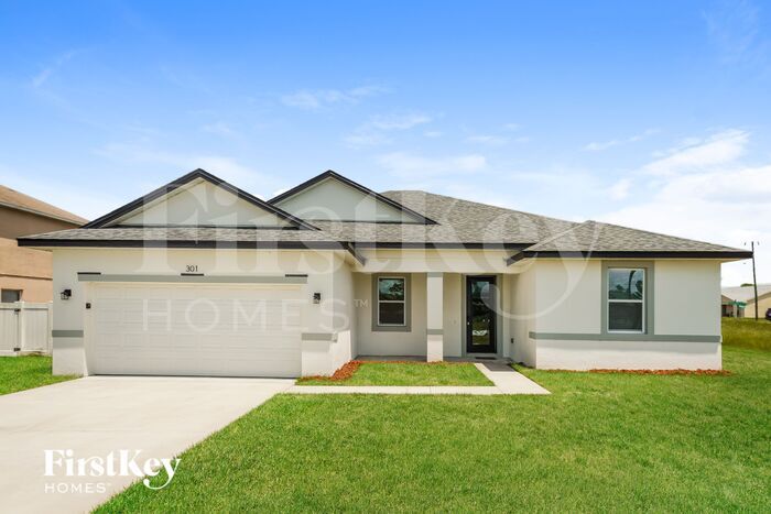 301 Cimarron Ct in Poinciana, FL - Building Photo
