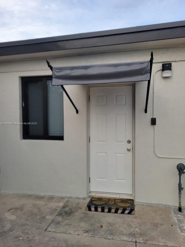 property at 8415 NW 171st St
