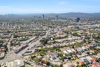 1063-1065 S Mansfield Ave in Los Angeles, CA - Building Photo - Building Photo