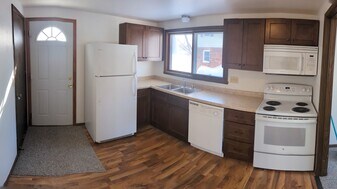 110-112-112 W Grant St in Lake Mills, WI - Building Photo