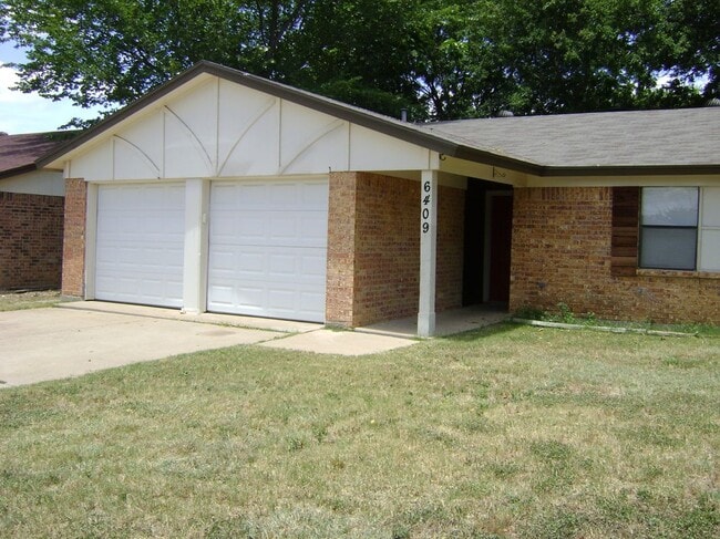 property at 6409 Macarthur Dr
