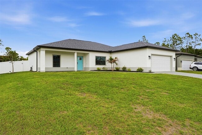 12542 Mohican Ave in Port Charlotte, FL - Building Photo - Building Photo